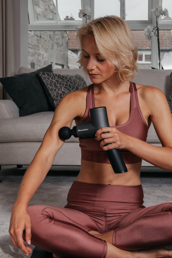 How to use a massage gun for warm up pre-workout